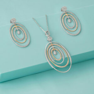 Diamond oval pendant necklace with matching drop earrings set.